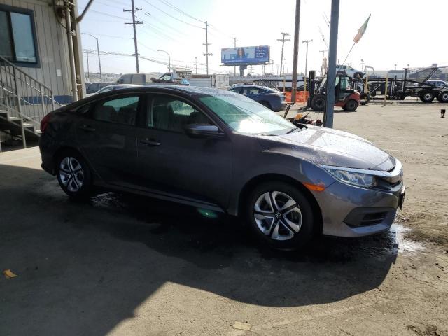 Photo 4 from auction – 2017 HONDA CIVIC LX with VIN 2HGFC2F58HH557876