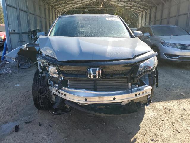 Photo 5 from auction – 2022 HONDA PILOT SE with VIN 5FNYF5H2XNB018003