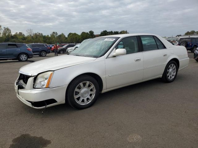 CADILLAC DTS 2011 with VIN 1G6KA5E61BU104530 - Photo from auction