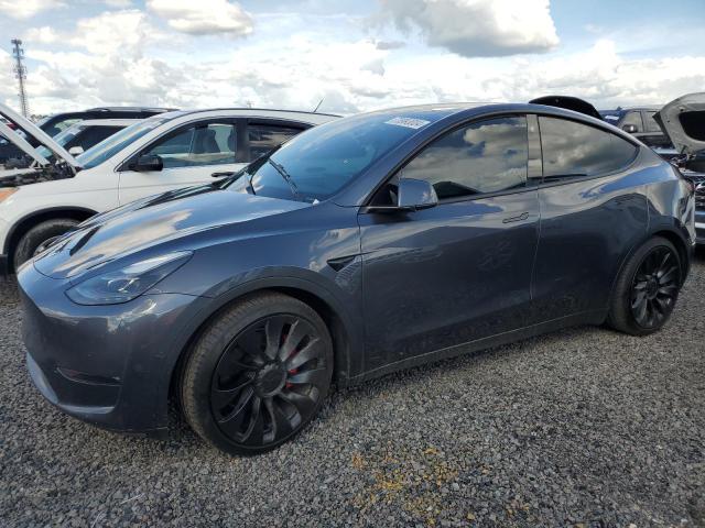TESLA MODEL Y 2022 with VIN 7SAYGDEF2NF448674 - Photo from auction