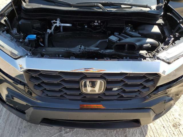 Photo 12 from auction – 2023 HONDA PASSPORT E with VIN 5FNYF8H54PB021378