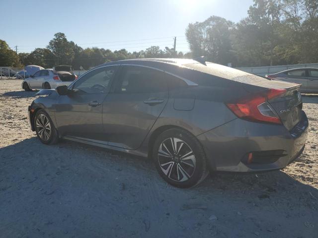 Photo 2 from auction – 2017 HONDA CIVIC EX with VIN 2HGFC1F39HH644310