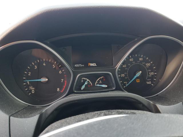 Foto 9 de la subasta – 2015 FORD FOCUS SE con VIN 1FADP3F21FL213687
