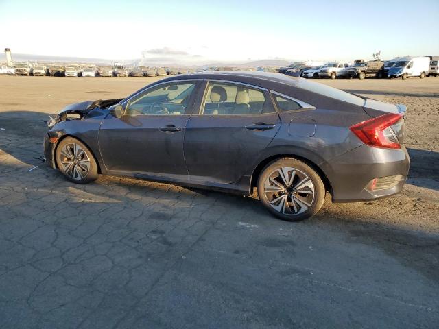 Photo 2 from auction – 2018 HONDA CIVIC EX with VIN JHMFC1F37JX018849