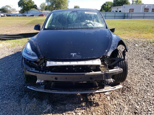 Photo 5 from auction – 2023 TESLA MODEL Y with VIN 7SAYGDEEXPA024036