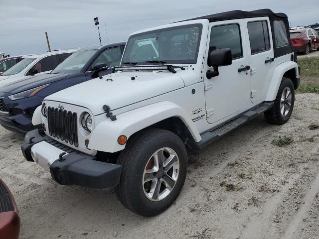 JEEP WRANGLER U 2016 with VIN 1C4BJWEGXGL217451 - Photo from auction