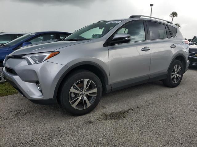 TOYOTA RAV4 XLE 2017 with VIN 2T3WFREV6HW383600 - Photo from auction