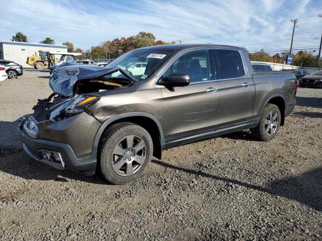 HONDA RIDGELINE 2020 with VIN 5FPYK3F76LB003114 - Photo from auction