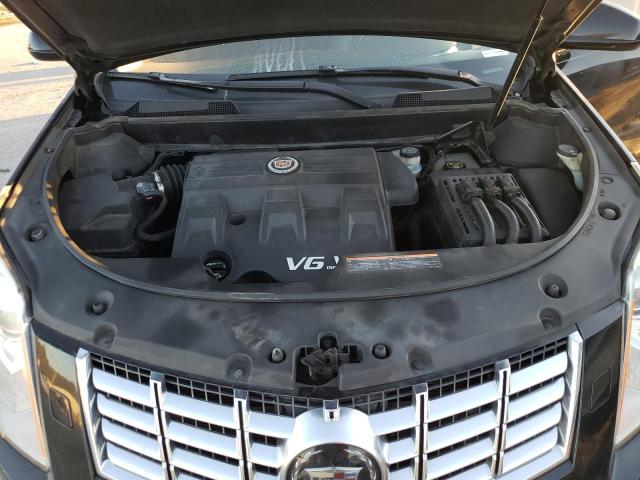 Photo 11 from auction – 2014 CADILLAC SRX PREMIU with VIN 3GYFNDE37ES522091