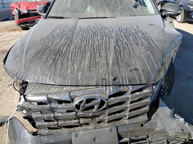 Photo 12 from auction – 2023 HYUNDAI TUCSON LIM with VIN 5NMJECAE3PH272103
