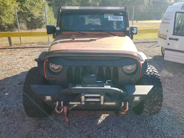 Photo 5 from auction – 2011 JEEP WRANGLER U with VIN 1J4BA3H12BL622552