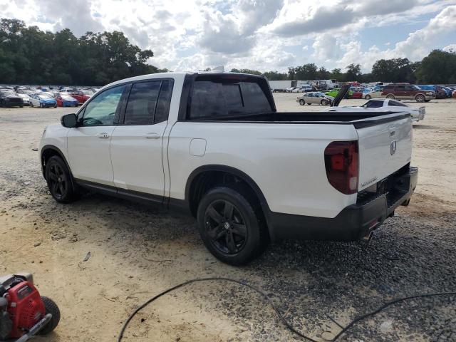Photo 2 from auction – 2022 HONDA RIDGELINE with VIN 5FPYK3F87NB006017