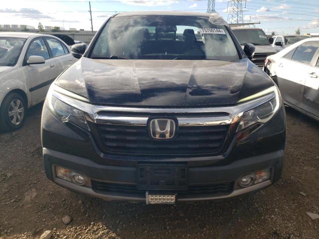 Photo 5 from auction – 2018 HONDA RIDGELINE with VIN 5FPYK3F76JB011288