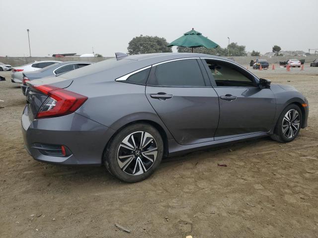 Photo 3 from auction – 2017 HONDA CIVIC EX with VIN 2HGFC1F32HH638591