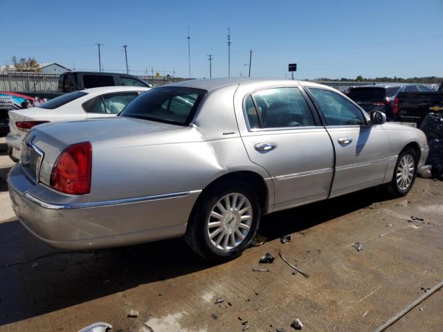 Photo 3 from auction – 2004 LINCOLN TOWN CAR E with VIN 1LNHM81W64Y668932