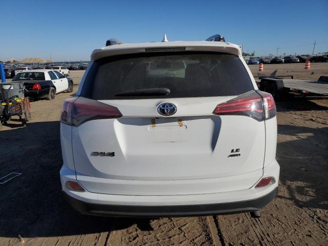 Photo 6 from auction – 2018 TOYOTA RAV4 LE with VIN 2T3BFREV8JW855557
