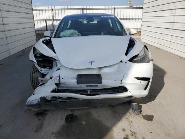 Photo 5 from auction – 2022 TESLA MODEL 3 with VIN 5YJ3E1EA6NF189302