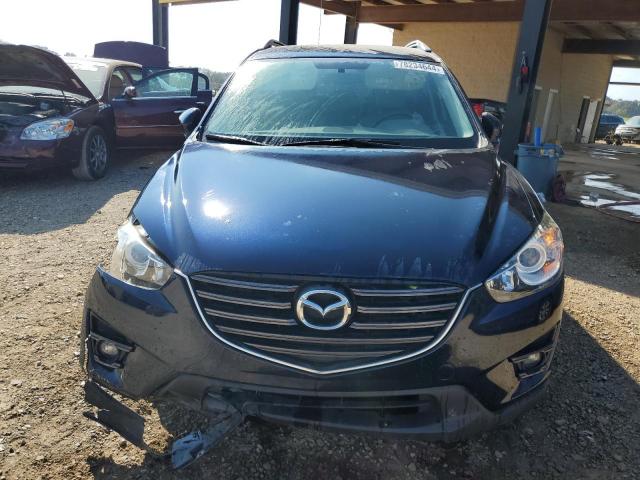 Photo 5 from auction – 2016 MAZDA CX-5 TOURI with VIN JM3KE2CY3G0608541