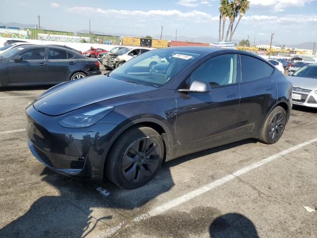 TESLA MODEL Y 2024 with VIN 7SAYGAEEXRF104778 - Photo from auction