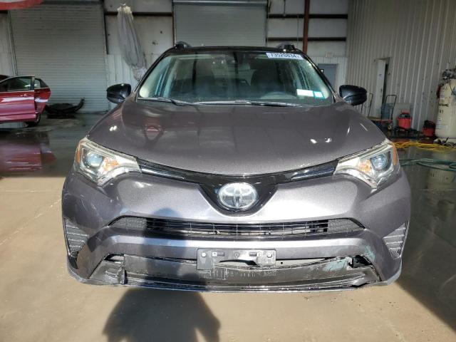 Photo 5 from auction – 2018 TOYOTA RAV4 LE with VIN JTMBFREV0JJ242833