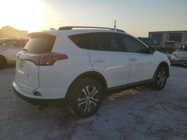 Photo 3 from auction – 2018 TOYOTA RAV4 LE with VIN JTMZFREV3JJ171433