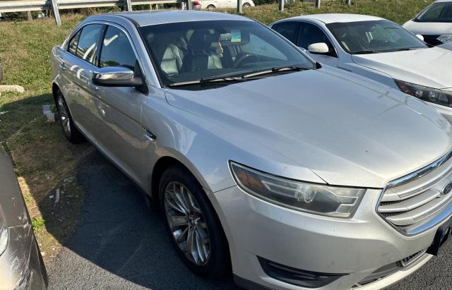 FORD TAURUS LIM 2014 with VIN 1FAHP2F84EG179929 - Photo from auction