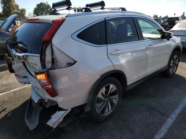 Photo 3 from auction – 2015 HONDA CR-V TOURI with VIN 5J6RM4H90FL069682