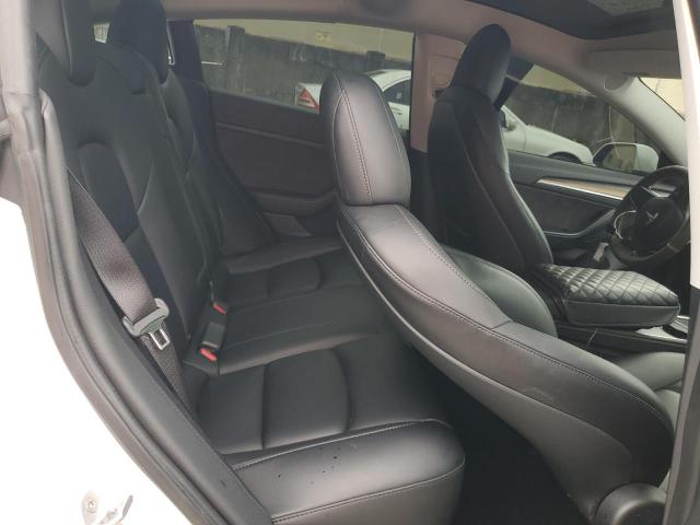 Photo 10 from auction – 2021 TESLA MODEL 3 with VIN 5YJ3E1EA9MF091203