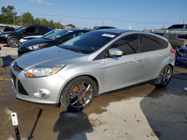 FORD FOCUS SE 2013 with VIN 1FADP3K28DL303051 - Photo from auction
