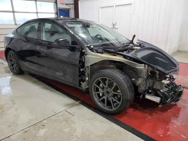 Photo 4 from auction – 2022 TESLA MODEL 3 with VIN 5YJ3E1EAXNF371164