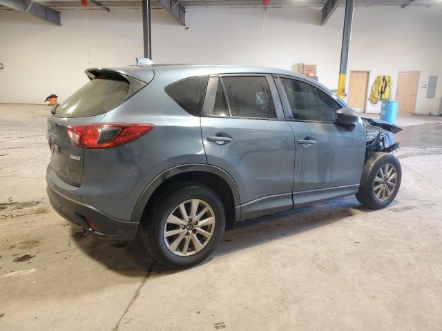 Photo 3 from auction – 2014 MAZDA CX-5 SPORT with VIN JM3KE4BE9E0427167