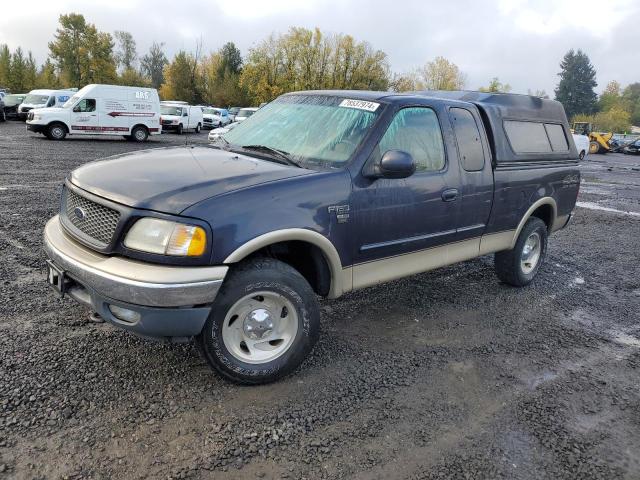 FORD F150 2000 with VIN 1FTRX18W3YNB27972 - Photo from auction