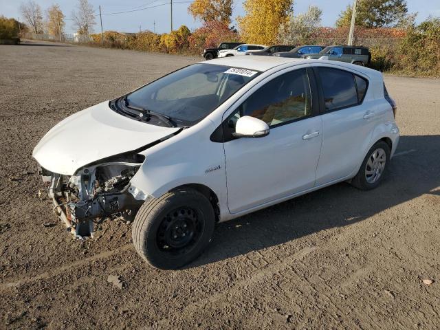 TOYOTA PRIUS C 2015 with VIN JTDKDTB30F1581296 - Photo from auction