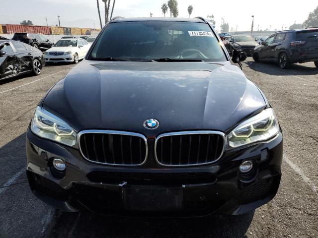 Photo 5 from auction – 2014 BMW X5 XDRIVE5 with VIN 5UXKR6C58E0J72890