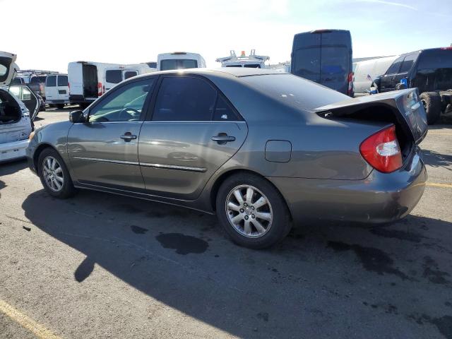 Photo 2 from auction – 2002 TOYOTA CAMRY LE with VIN JTDBE30K620122555