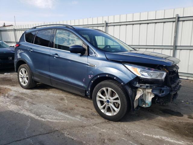 Photo 4 from auction – 2018 FORD ESCAPE SE with VIN 1FMCU9GD1JUC04553