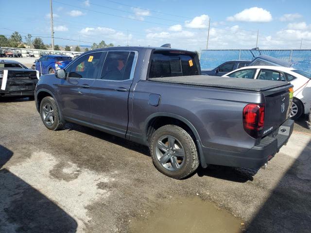 Photo 2 from auction – 2022 HONDA RIDGELINE with VIN 5FPYK3F54NB013058