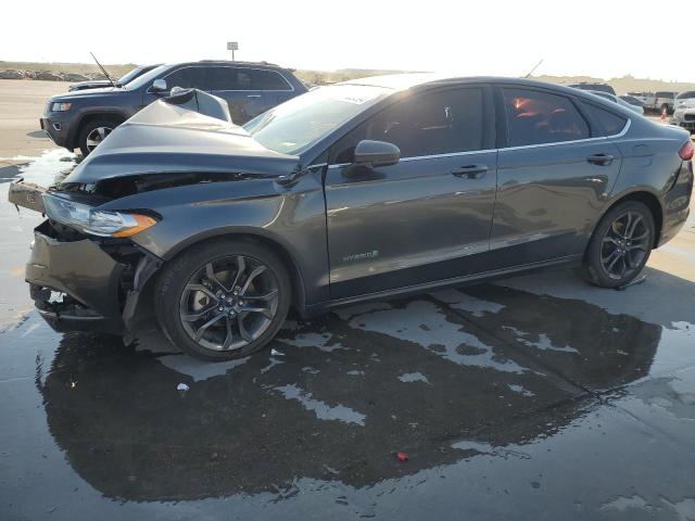 FORD FUSION SE 2018 with VIN 3FA6P0LU0JR168765 - Photo from auction