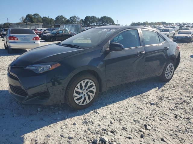 TOYOTA COROLLA L 2019 with VIN 5YFBURHE6KP935923 - Photo from auction