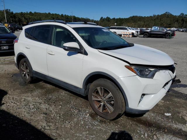 Photo 4 from auction – 2016 TOYOTA RAV4 XLE with VIN JTMWFREV4GD090791