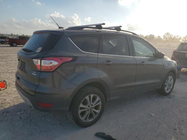 Photo 3 from auction – 2018 FORD ESCAPE SE with VIN 1FMCU0GD2JUC49321