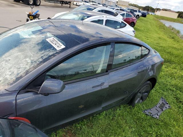TESLA MODEL 3 2023 with VIN 5YJ3E1EA8PF655461 - Photo from auction