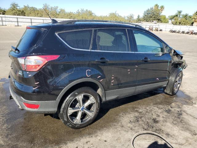 Photo 3 from auction – 2018 FORD ESCAPE SEL with VIN 1FMCU9HD0JUB55019