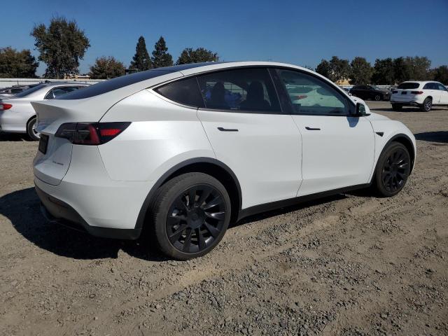 Photo 3 from auction – 2023 TESLA MODEL Y with VIN 7SAYGDEE5PF748736