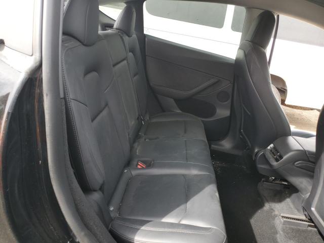 Photo 11 from auction – 2023 TESLA MODEL Y with VIN 7SAYGDEE2PF604240