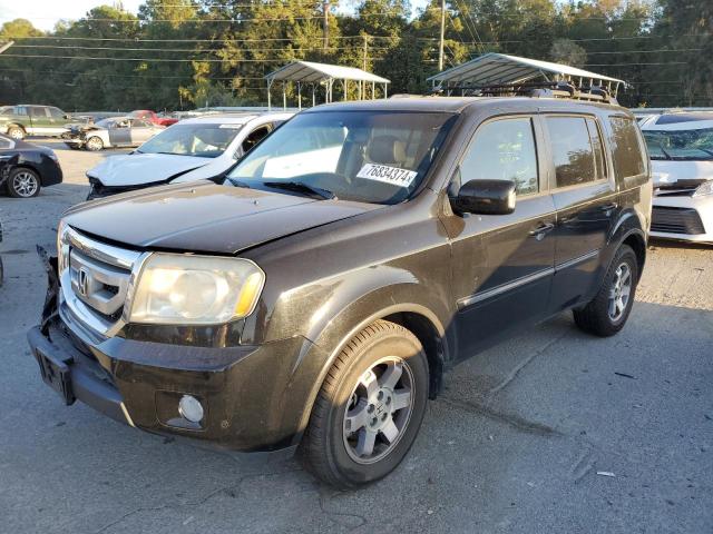 Photo 1 from auction – 2010 HONDA PILOT TOUR with VIN 5FNYF4H83AB036030