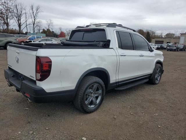 Photo 3 from auction – 2023 HONDA RIDGELINE with VIN 5FPYK3F75PB012599