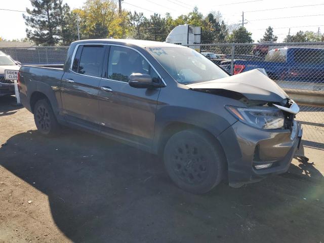 Photo 4 from auction – 2022 HONDA RIDGELINE with VIN 5FPYK3F79NB038099