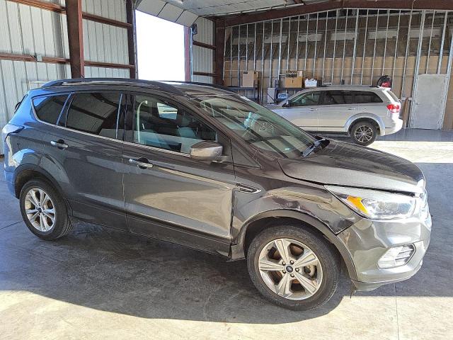 Photo 4 from auction – 2018 FORD ESCAPE SE with VIN 1FMCU0GD9JUB76576