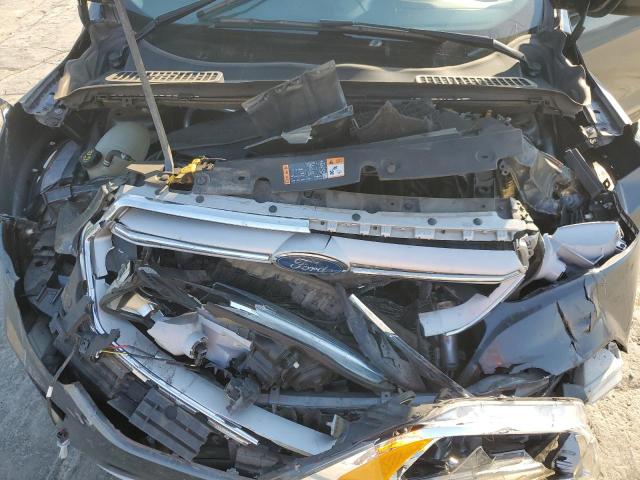 Photo 12 from auction – 2018 FORD ESCAPE SE with VIN 1FMCU9GD3JUD40196